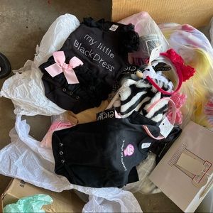 1 bag of infant girl clothes toys headbands shoes blankets etc.